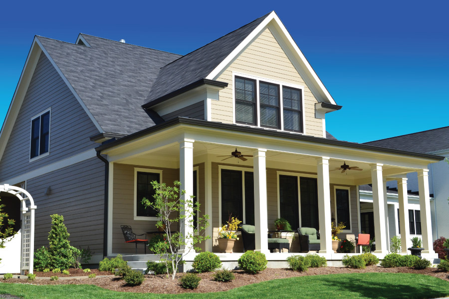 Exterior photo of a home with green grass in front