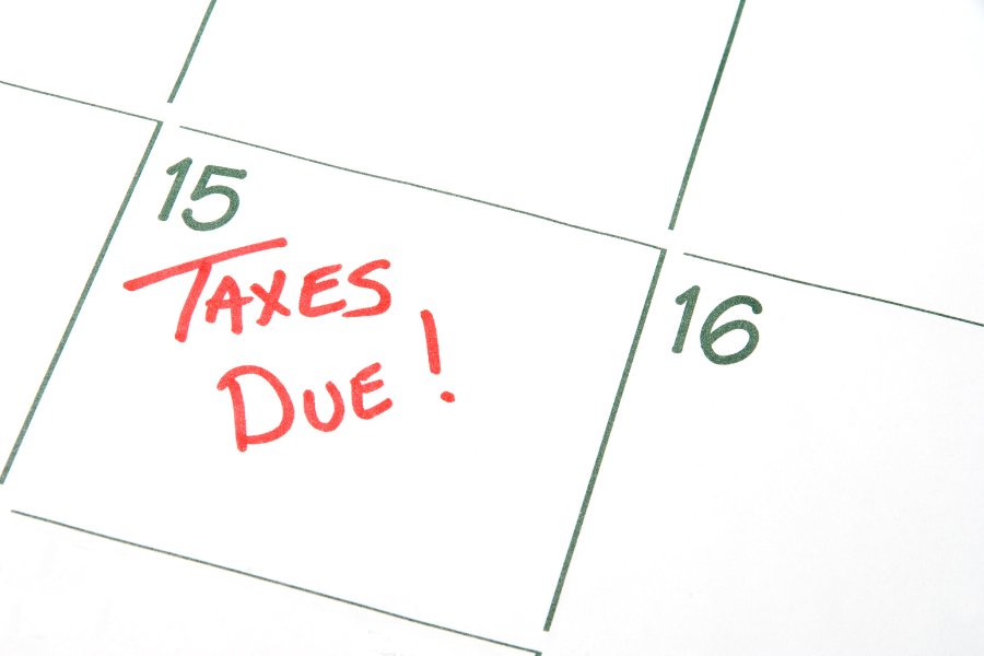 calendar with "taxes due" on the 15th of the month