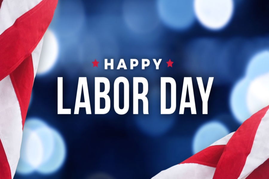 American flag background with "happy Labor Day" written on top.